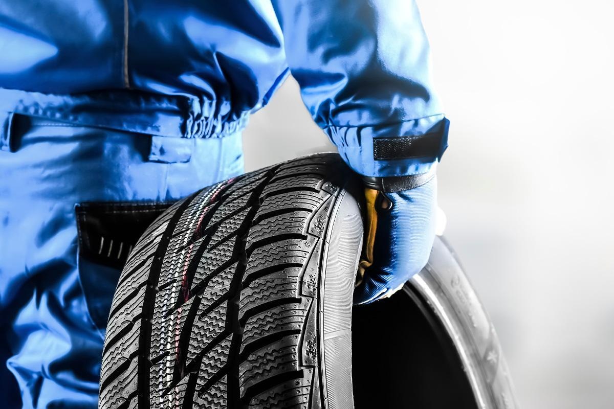 man hold tire